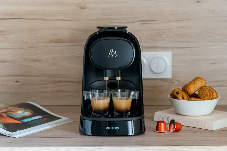 La machine à café à capsules du premier étage